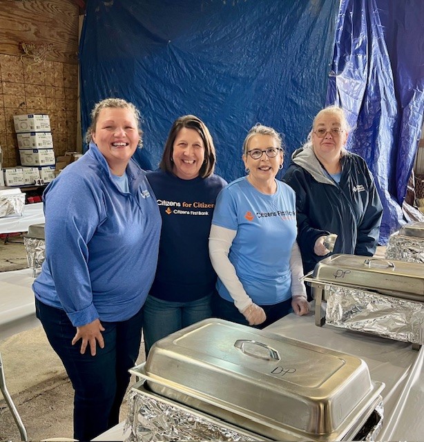 Citizens First Bank employees participating in a local Dairy Breakfast
